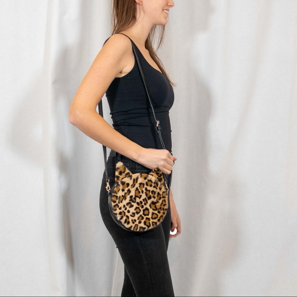 Round cheetah pattern vegan purse by Monki